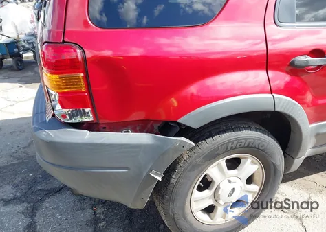 2003 Ford Escape Xlt z USA, uszkodzony, nr VIN 1FMYU93123KB74415